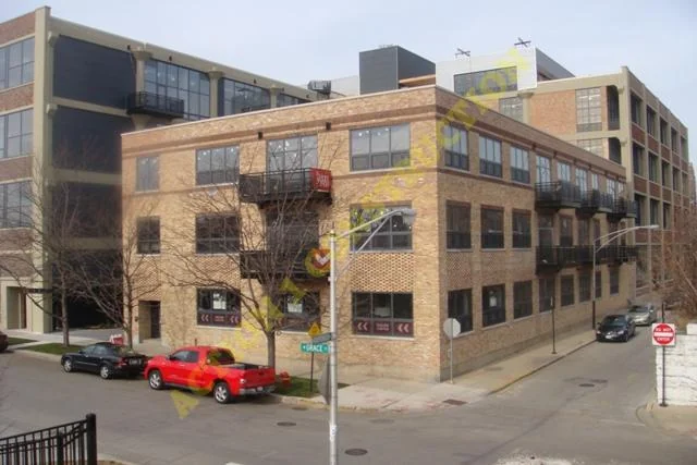 Brick commercial building shown by Action #1 Construction