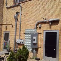 Brick building meter bank in the AK Electric gallery