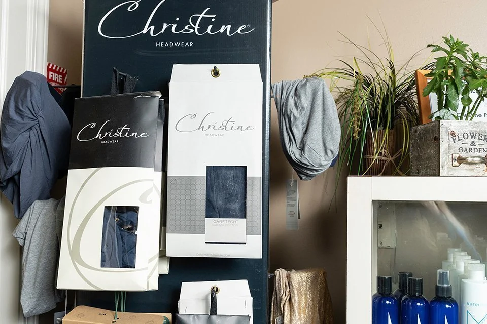 Hair wraps on display at Christine Pusateri Hair Solutions
