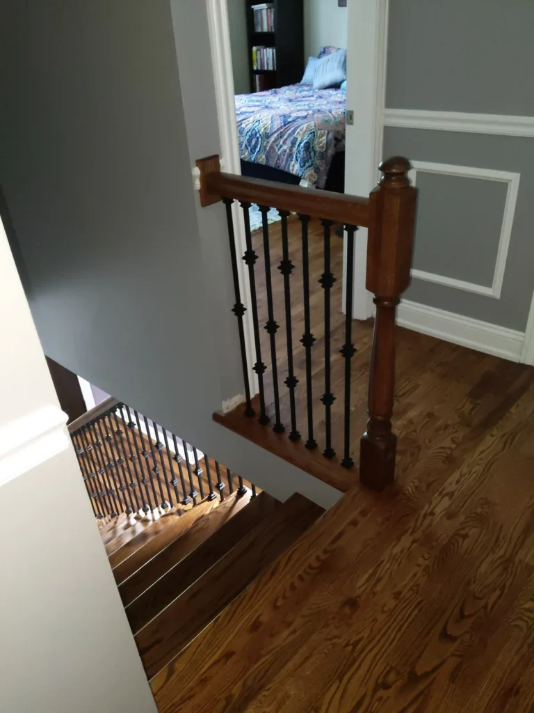 Wood floor and stair landing shown by CMS Floors