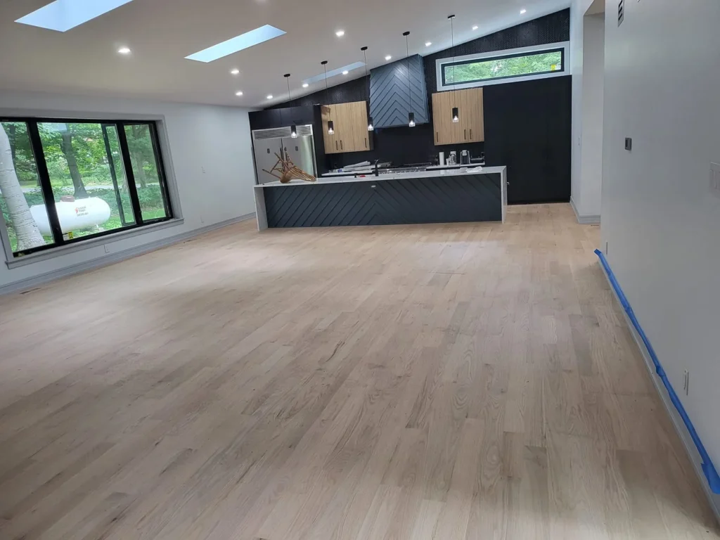 Open room floor blue island in the DS Superior Hardwood Flooring gallery