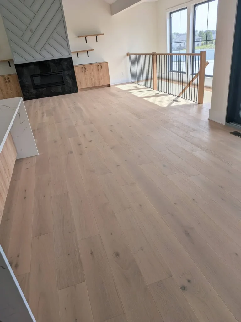 Wide plank floor stone fireplace in the DS Superior Hardwood Flooring gallery