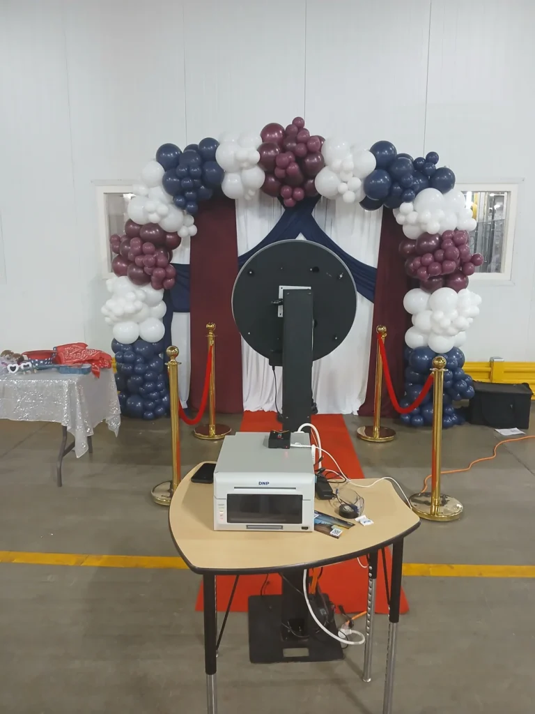 Photo booth equipment shown by Fiesta Party Rental