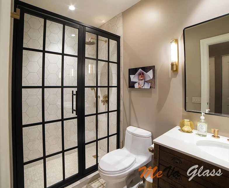 Black-grid shower enclosure shown by Meva Glass