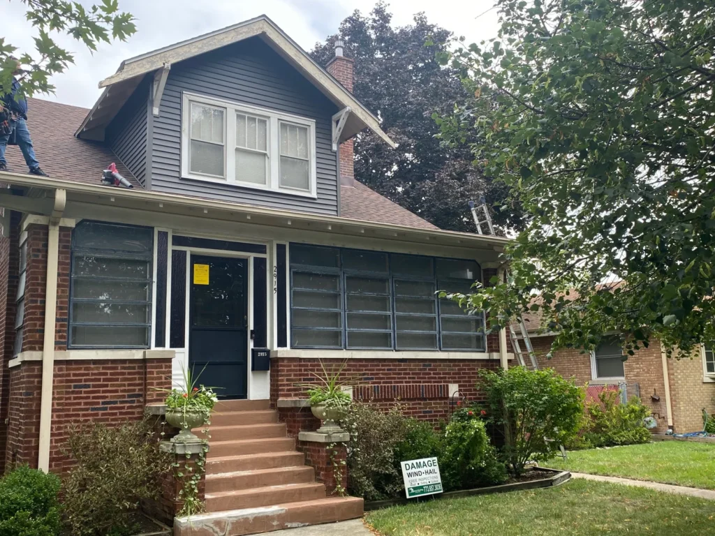 Brick house new roof in the Midwest Renovation Services gallery