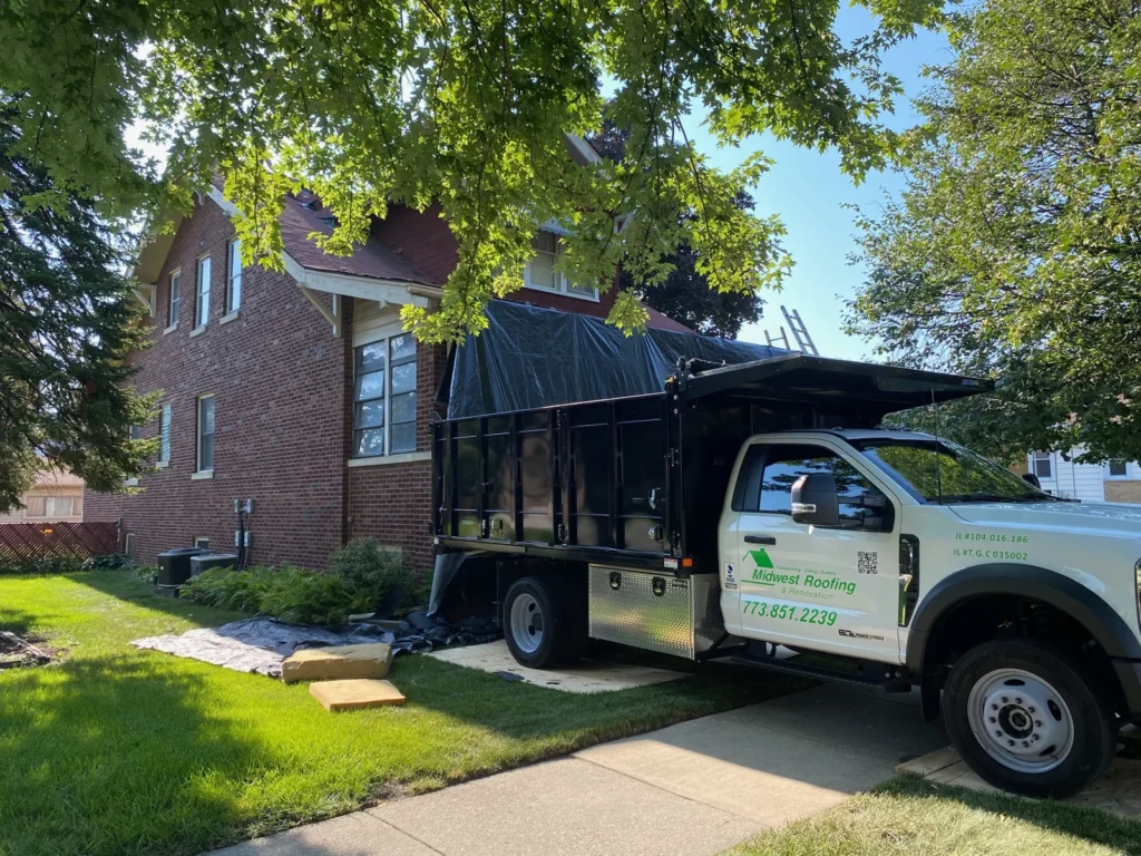 Roofing truck and crane in the Midwest Renovation Services gallery