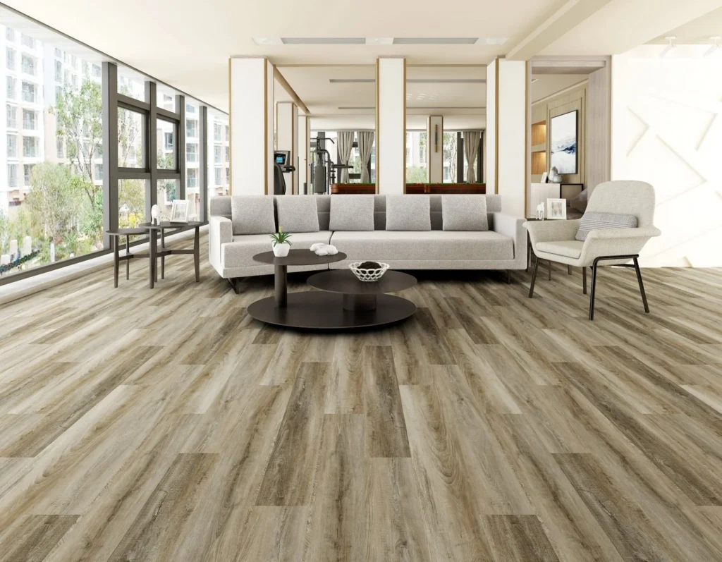 Warm-toned flooring in a sitting room product setting from Moda Floors