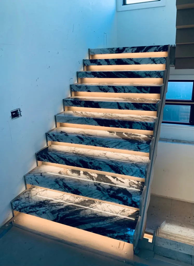 Illuminated dark stairs front in the New Stone Design gallery