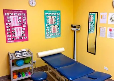 Therapy room with educational posters at PDR Physical Therapy