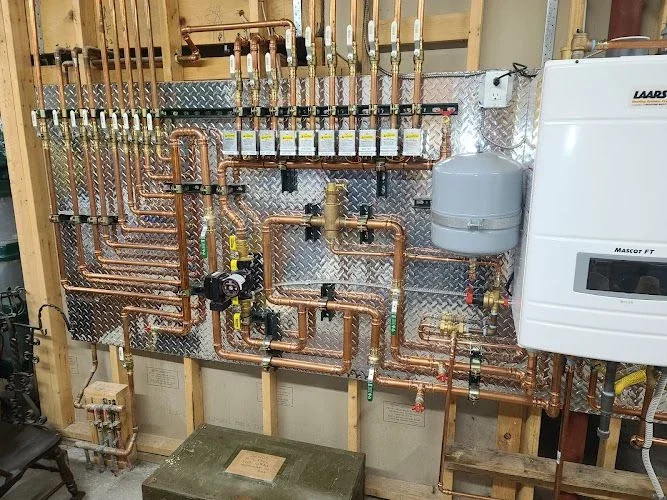 Boiler manifold copper pipework in the Perfect Air Company gallery
