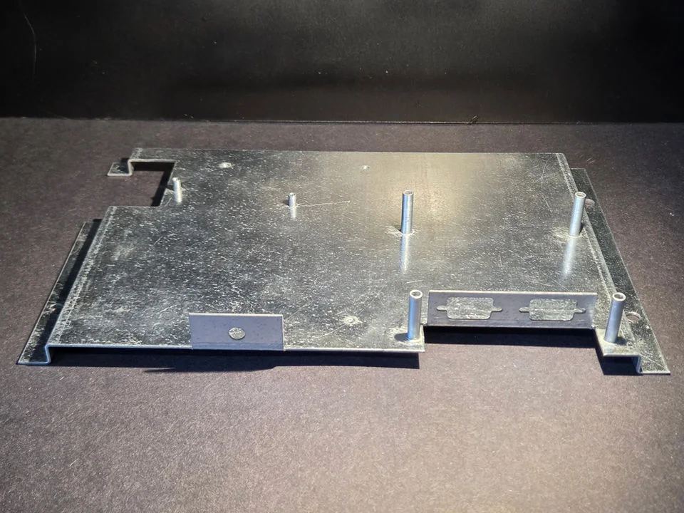 Galvanized metal panel with mounting studs from Quad-Metal Company