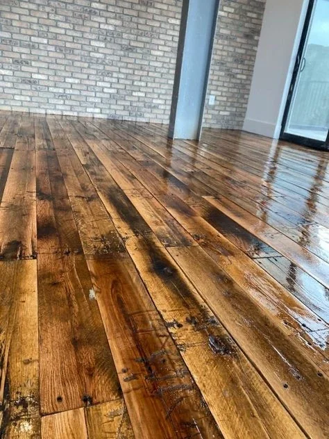 Illustration: Brown plank floor detail in the R Floor Inc gallery