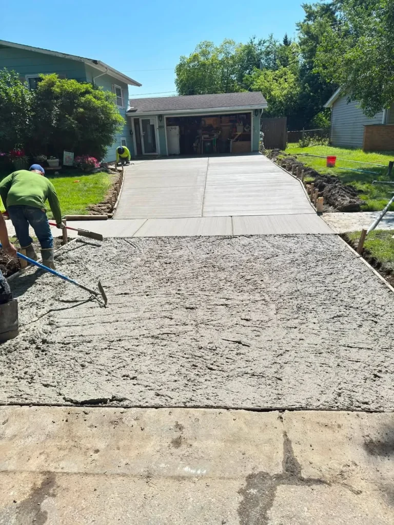 Salor crew placing concrete for a residential driveway in Hanover Park