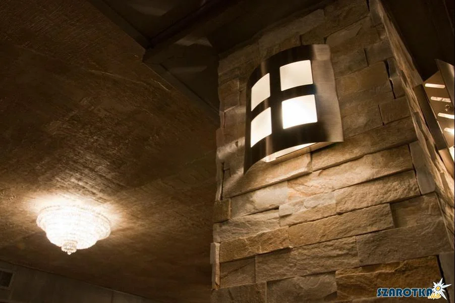 Stone wall lantern at Szarotka in Justice