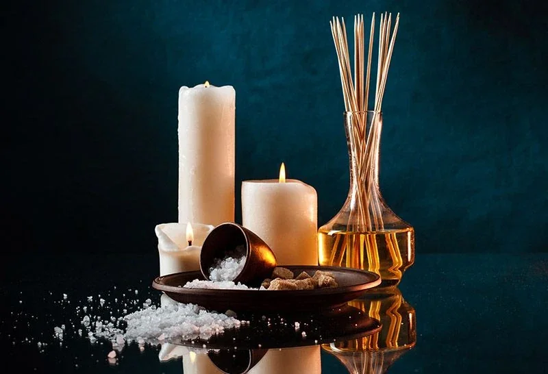 Promotional still life with candles and bath salts