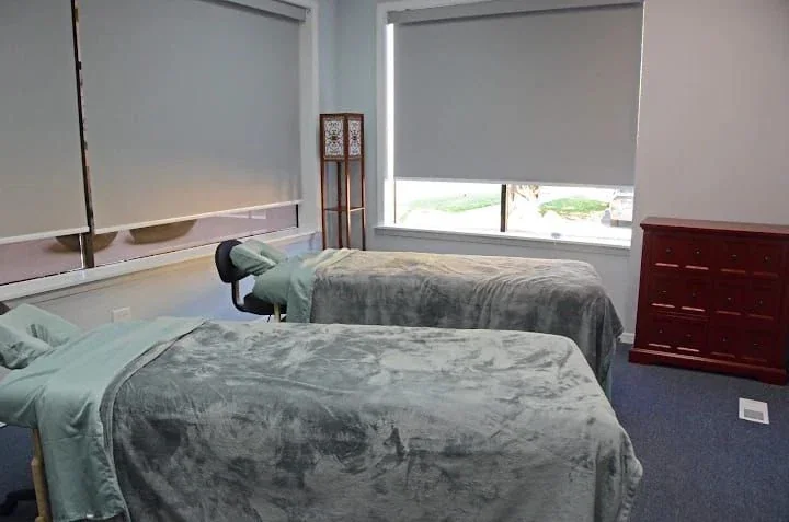 Two covered treatment tables in one room