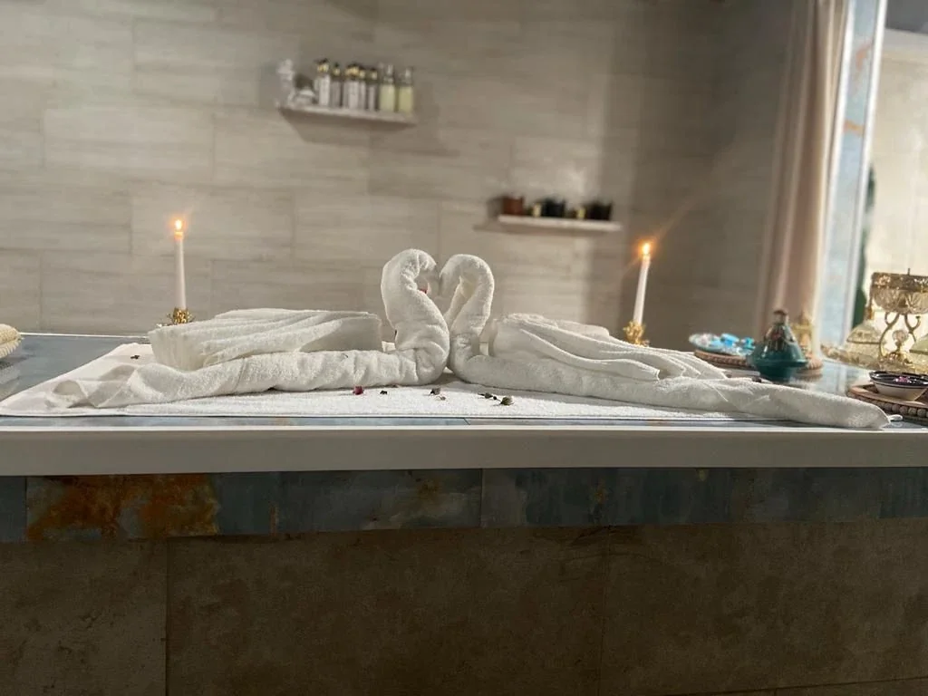 Stone spa table with steam and candles