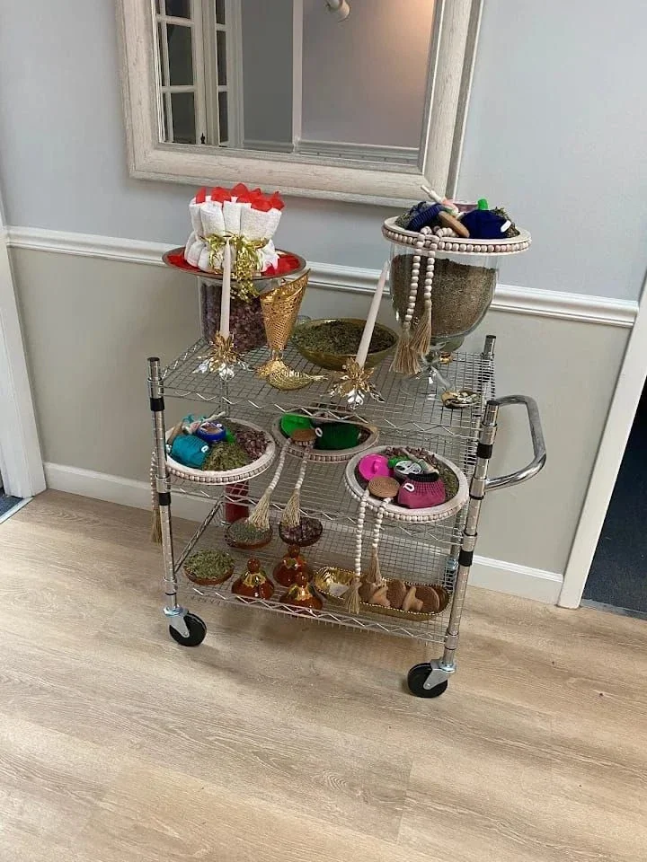 Decorative trolley with tea service and flowers