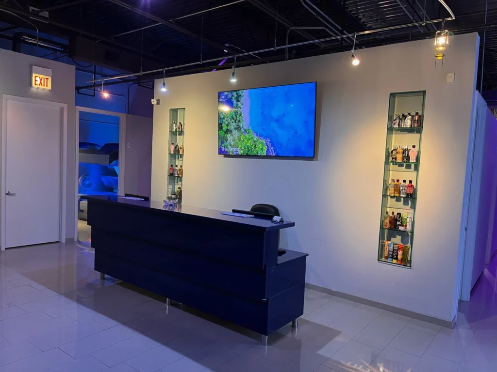 Reception counter beside wall-mounted product displays