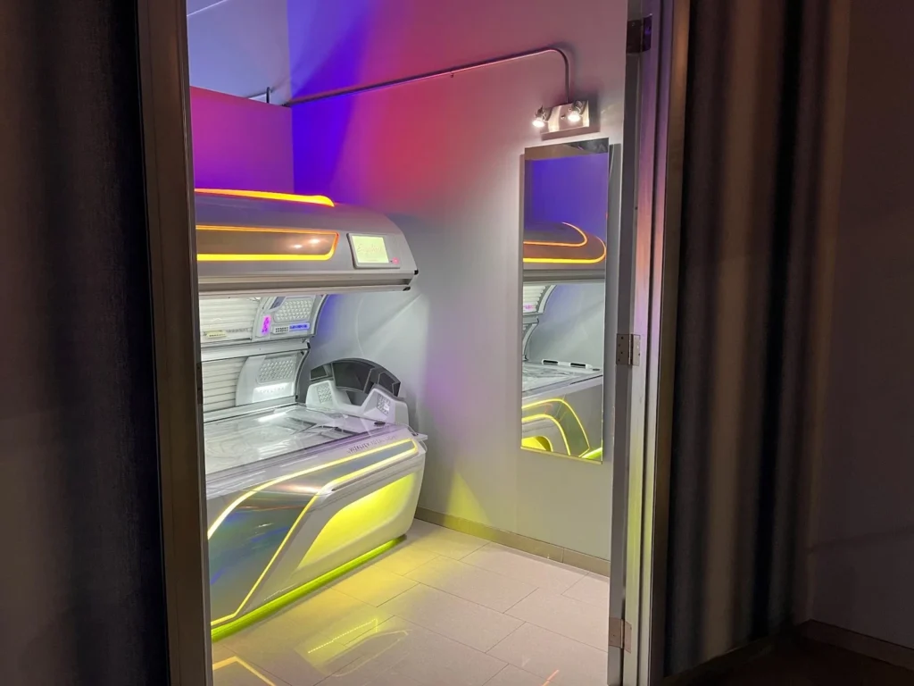 Tanning bed inside a salon room