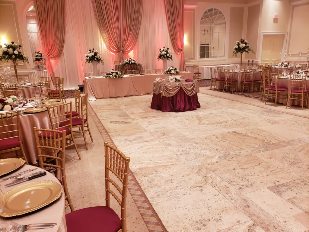 Pink lit reception dance floor shown in the Venuti’s in Addison gallery