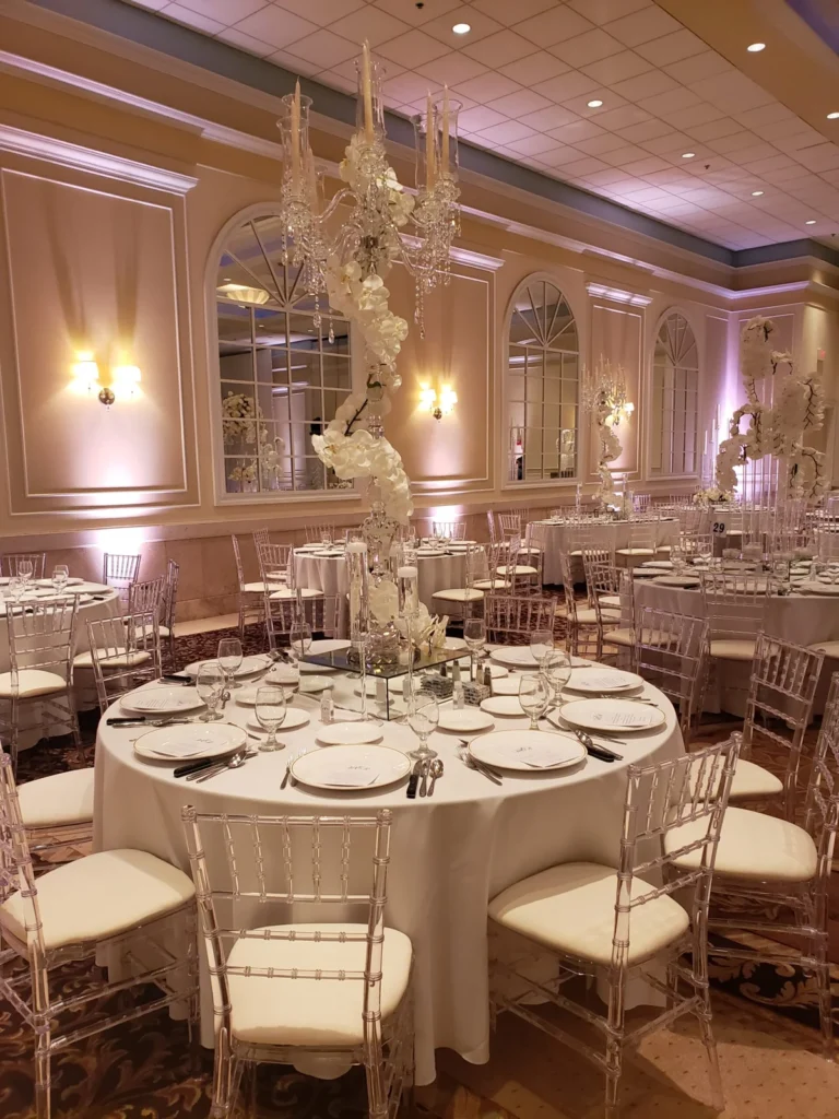 Pink lit round table layout shown in the Venuti’s in Addison gallery